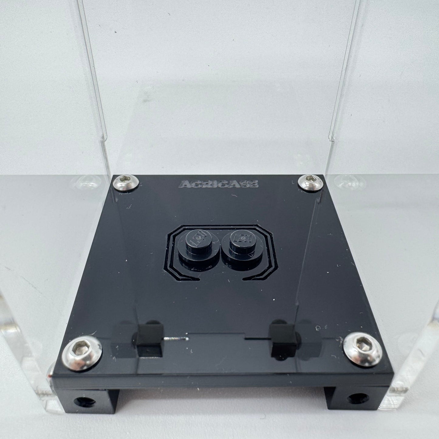 Custom LEGO® minifigure display case demonstrating compatibility with any minifigure design and with official LEGO studs