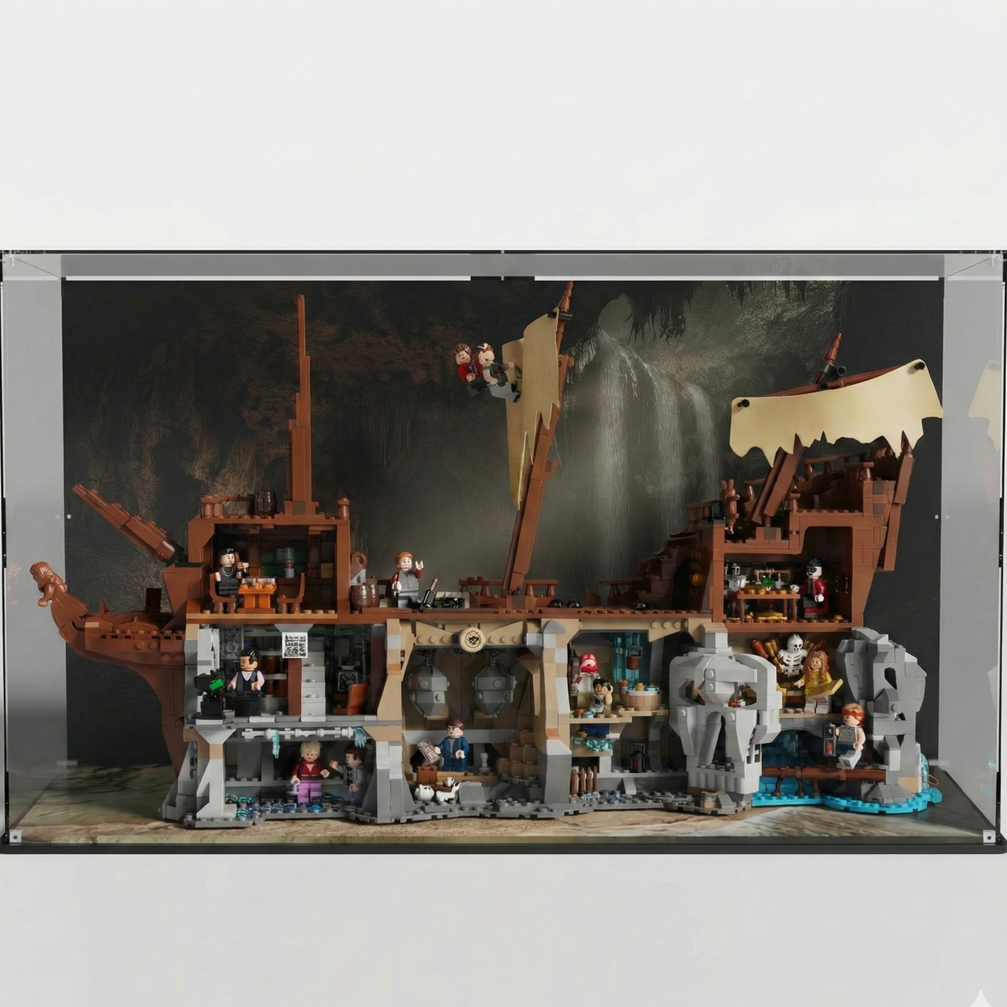 UV Protected display case for LEGO Ideas The Goonies 21363 inside premium LEGO display case with cavern waterfall background