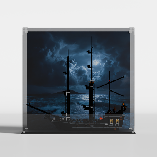 front view of LEGO® The Black Pearl 4184 inside premium LEGO display case with moonlit storm-sea background
